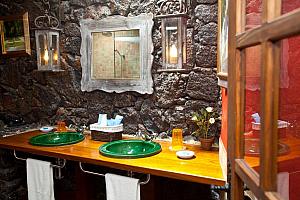 Bathroom with Canarian stone walls