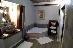 Bathroom with corner bath