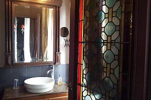 Bathroom with stained glass