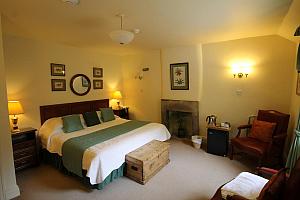 Room with fireplace and easy chairs