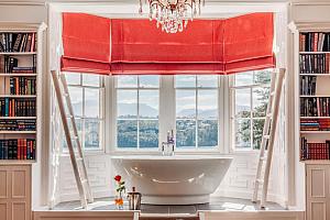 Bath overlooking the sea