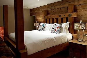 Kingsize bed of reclaimed timber