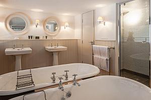Bathroom with two baths and double shower
