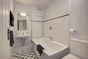 Big bath with shower