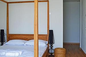 Modern four-poster bed