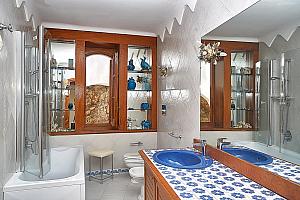 Bathroom with bath and shower