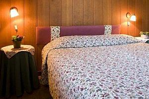 Wood-panelled bedrooms